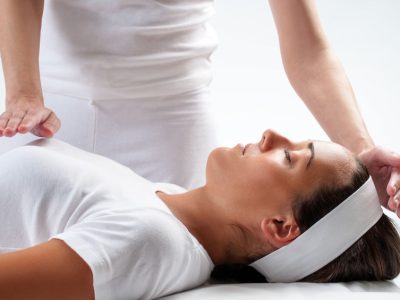 Woman at reiki session.